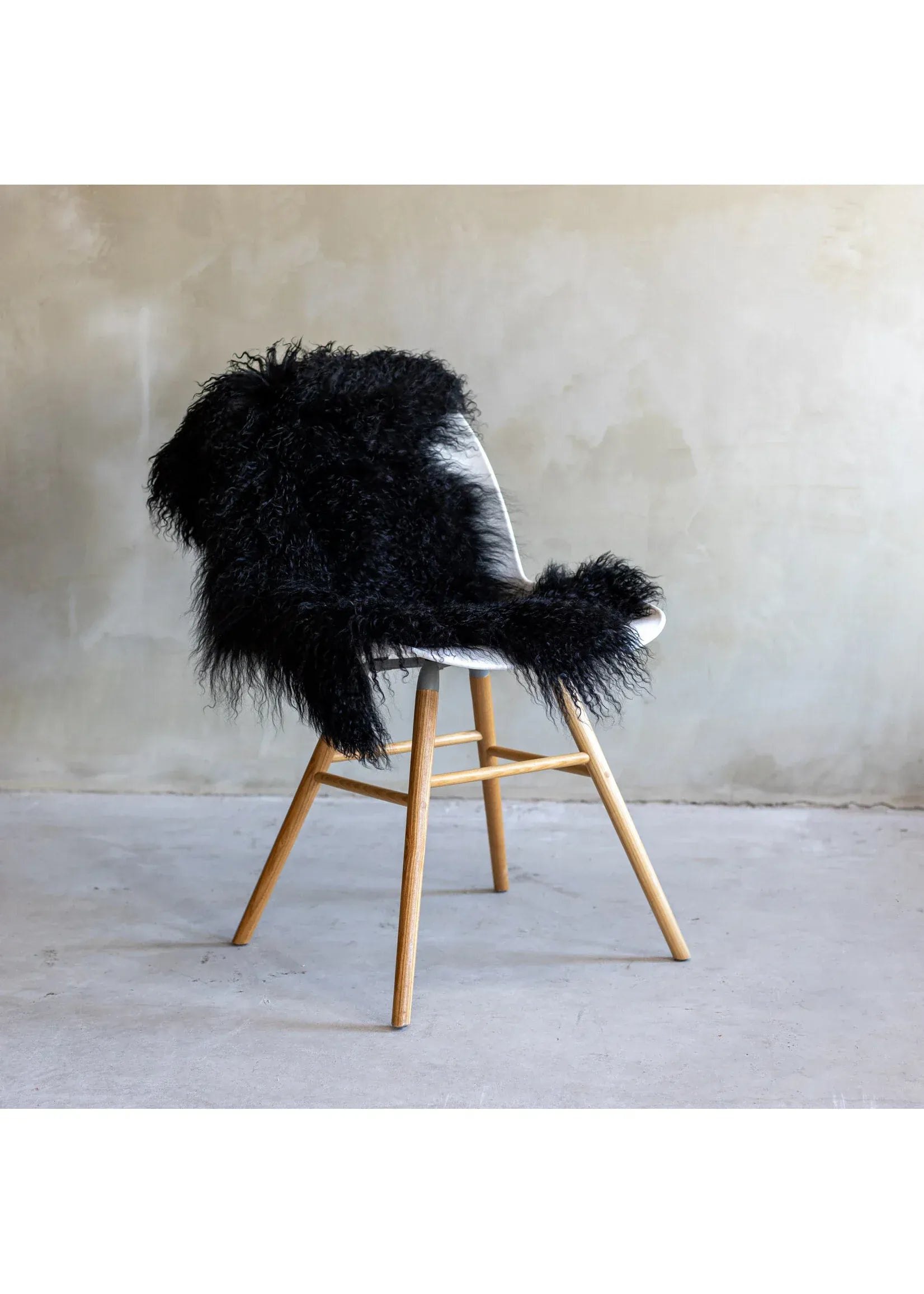 Langhåret  lammeskind - Sort Uldplaiden.dk